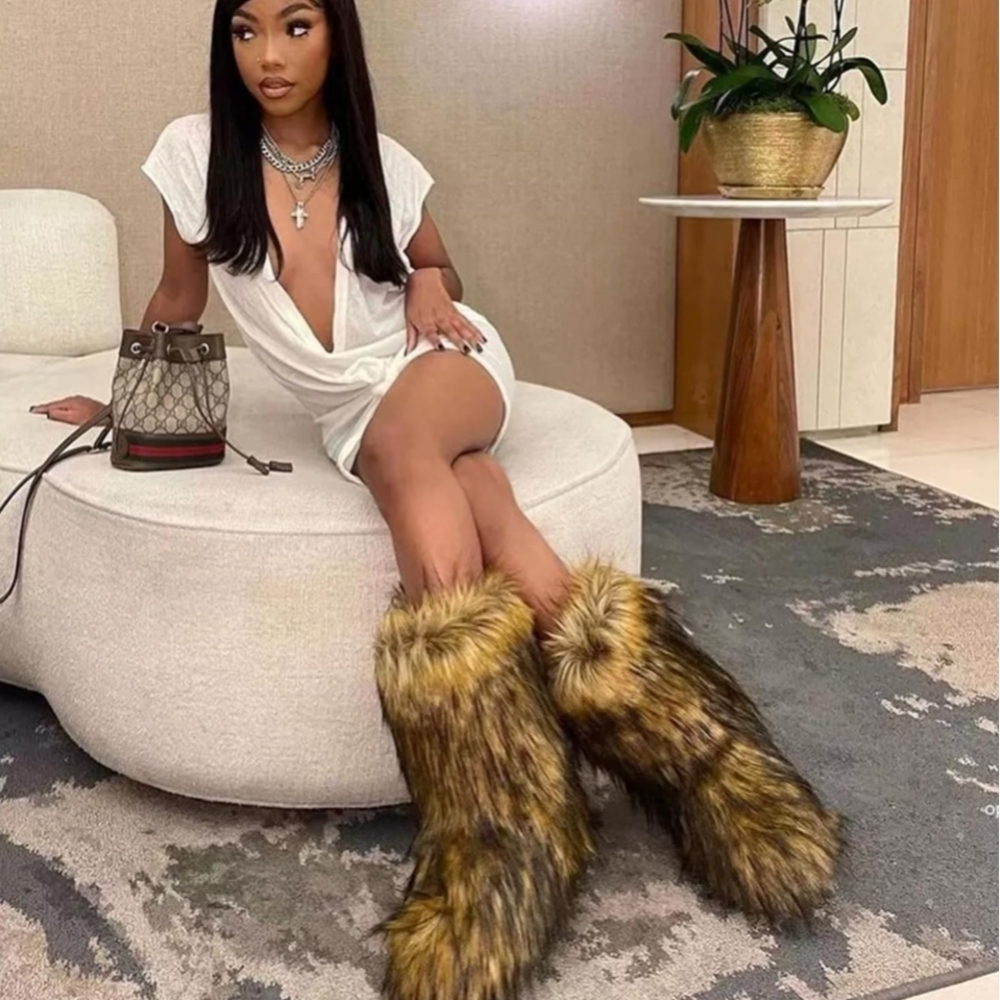 faux fur boots, often referred to as "yeti boots" or "fluffy boots". - Picture 4 of 6